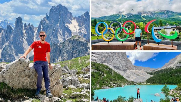 Peisaj spectaculos din Dolomiti cu Lacul Braies, munti stancosi si apa turcoaz intr-un cadru natural de poveste